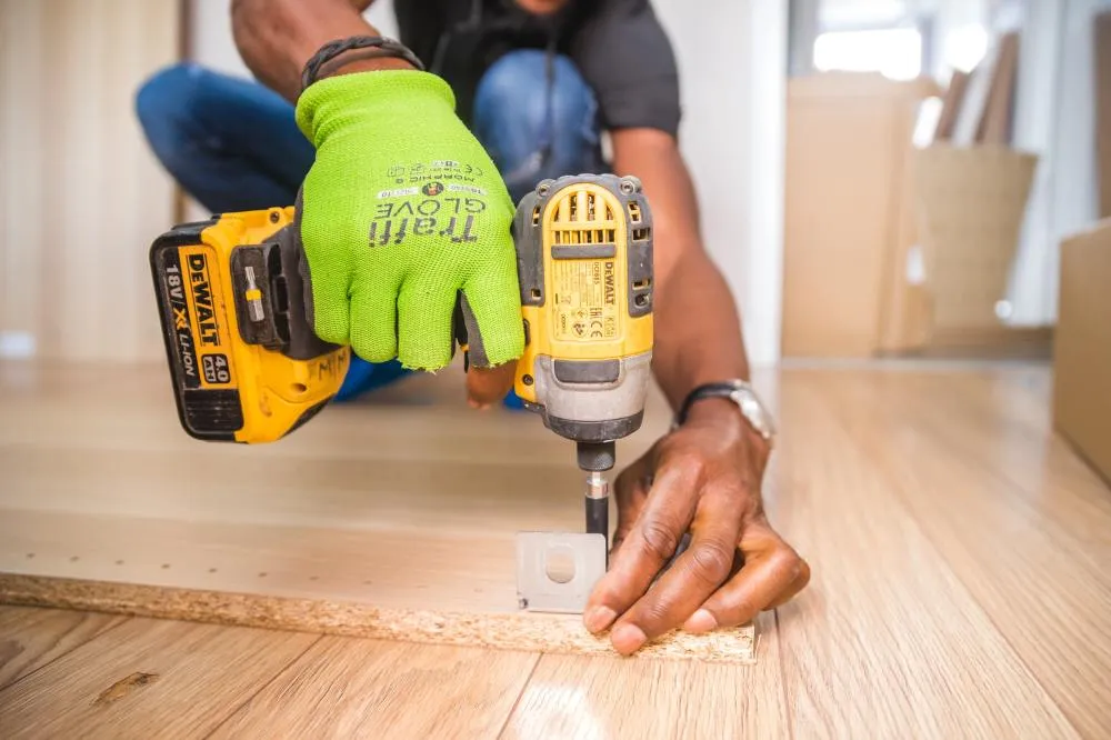 construction worker using electric tools